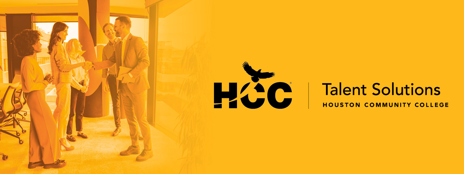 HCC Talent Solutions | A business professional standing in a hallway filled with books on both sides